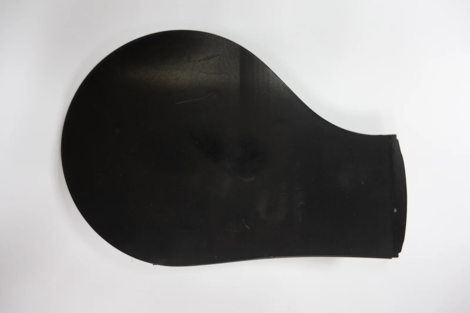 The reverse of a masking part, shaped to fit the production component.
