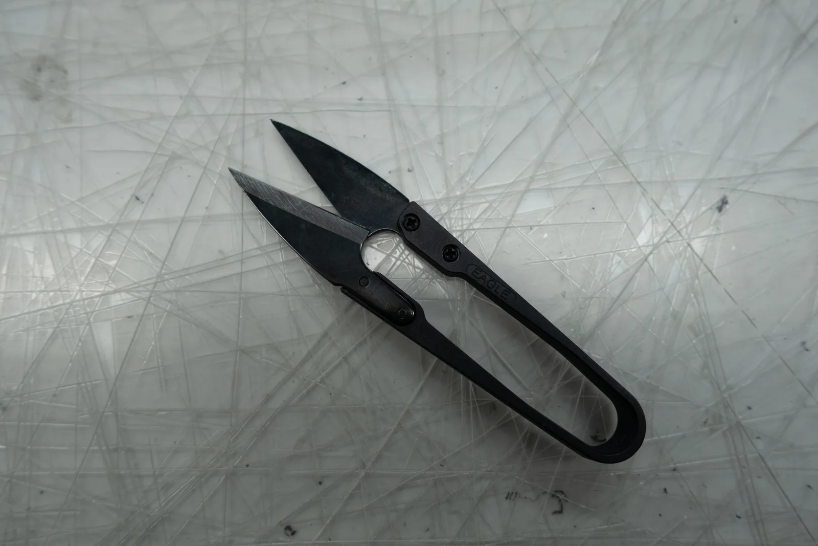 The technician's trimming tool at her workstation.