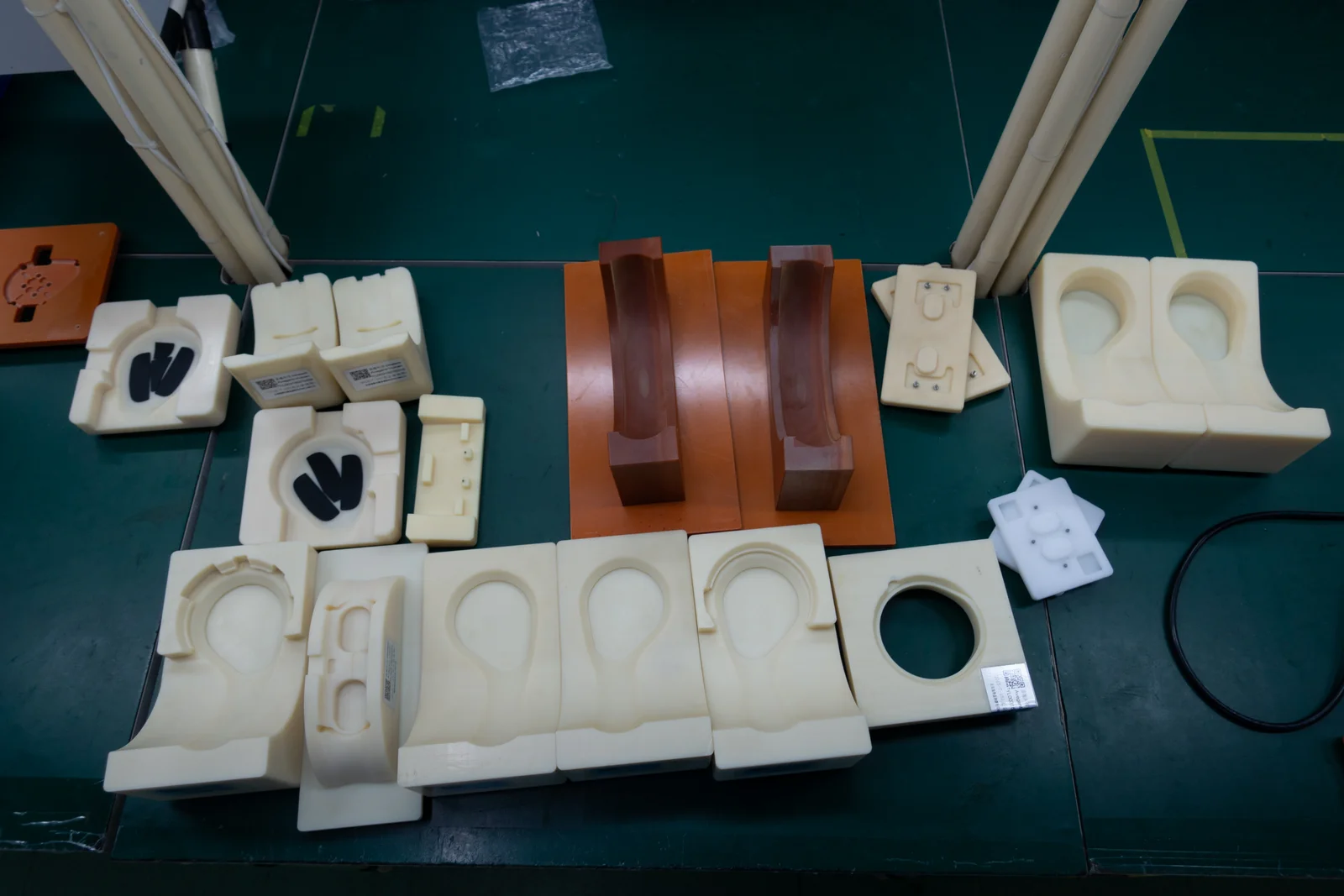 Most of the assembly fixtures I designed, grouped together. Additional fixtures and later versions held the subassemblies in similar ways during production.