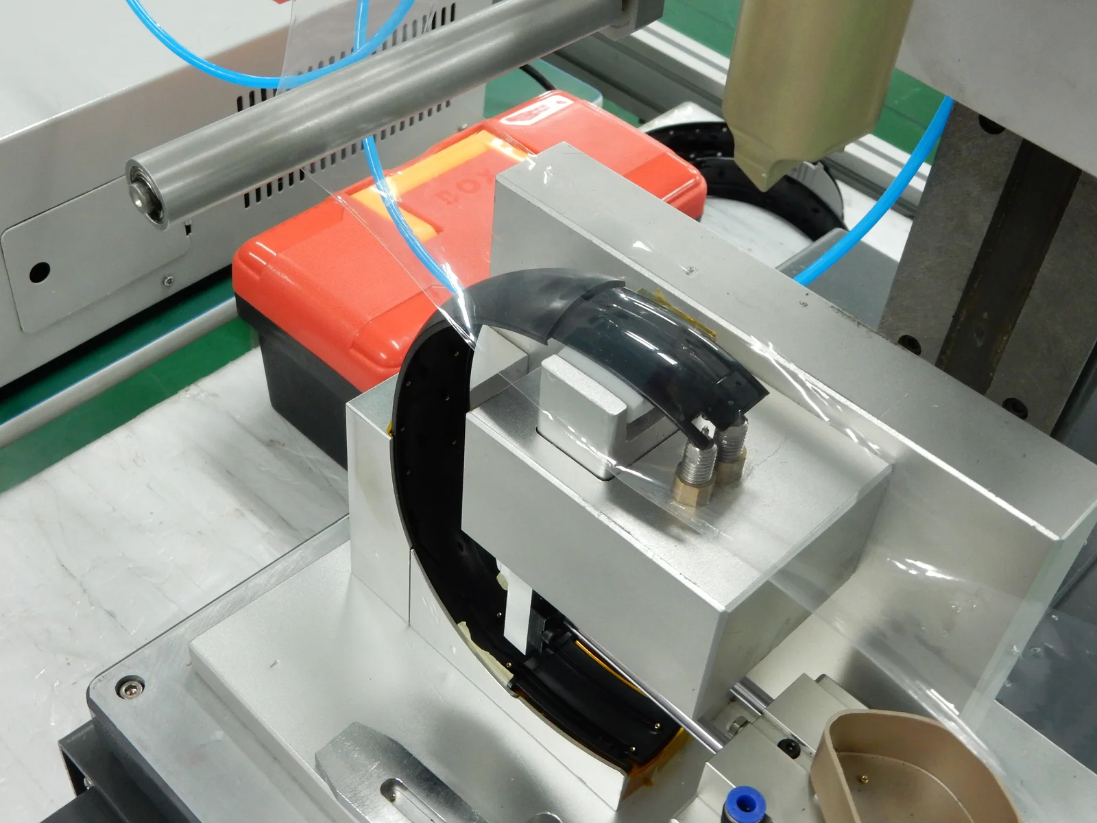 A custom fixture and supports for locating the outer headband during insert installation.