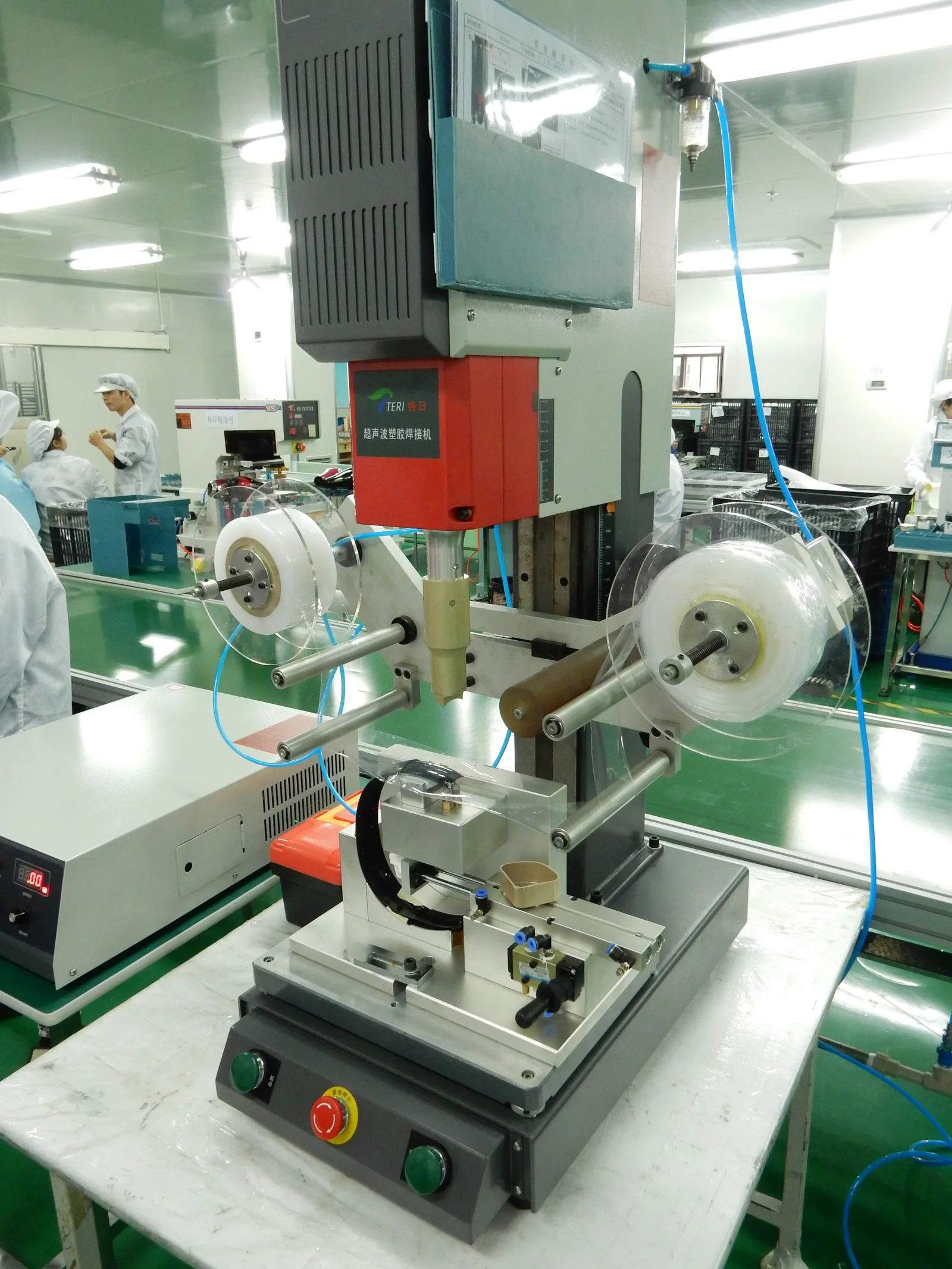 Production threaded-insert installation on the ultrasonic welding machine.