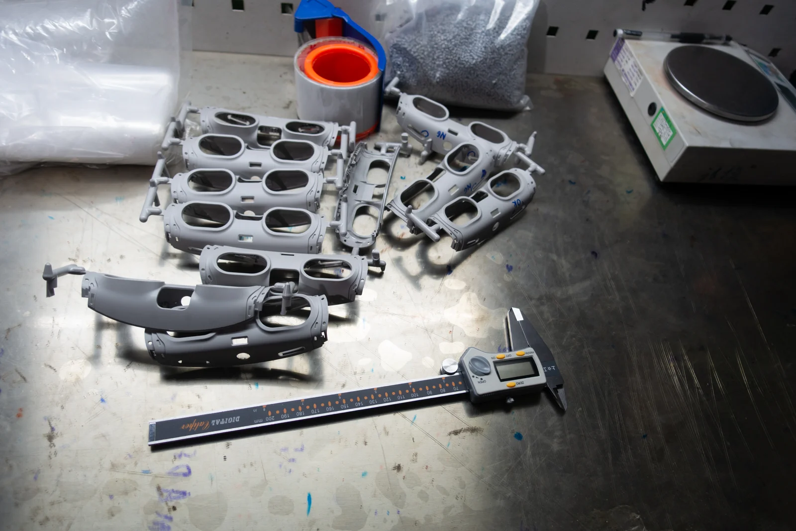 Faceplate trial parts at one of my press-side QC stations.